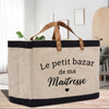 a canvas bag with a leather handle that says le petit bazar de ma
