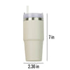a white cup with a straw sticking out of it