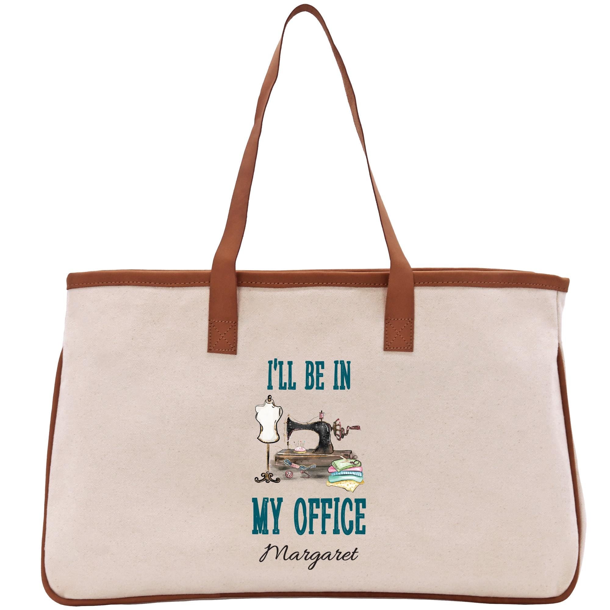 a canvas bag with a sewing machine on it