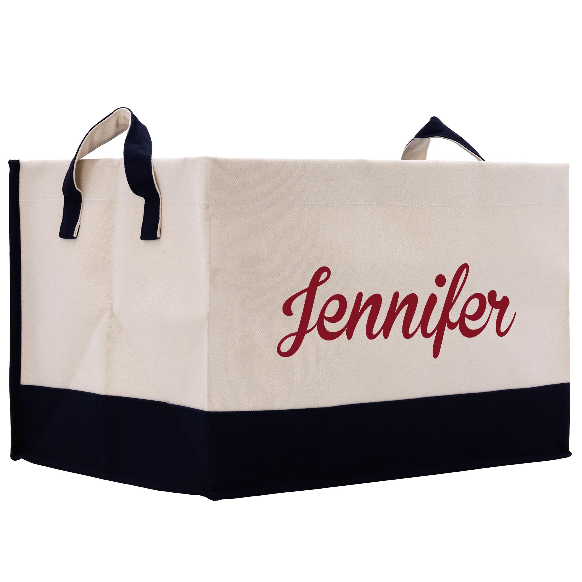A beige and black tote bag with the name &quot;Jennifer&quot; printed in red on it.