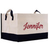 A beige and black tote bag with the name "Jennifer" printed in red on it.