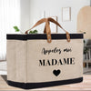 a canvas bag with a black heart on it