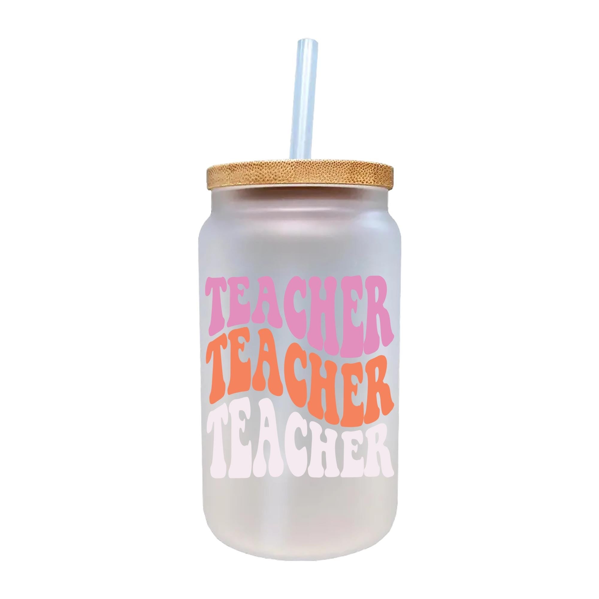 a glass with a straw in it that says teacher teacher