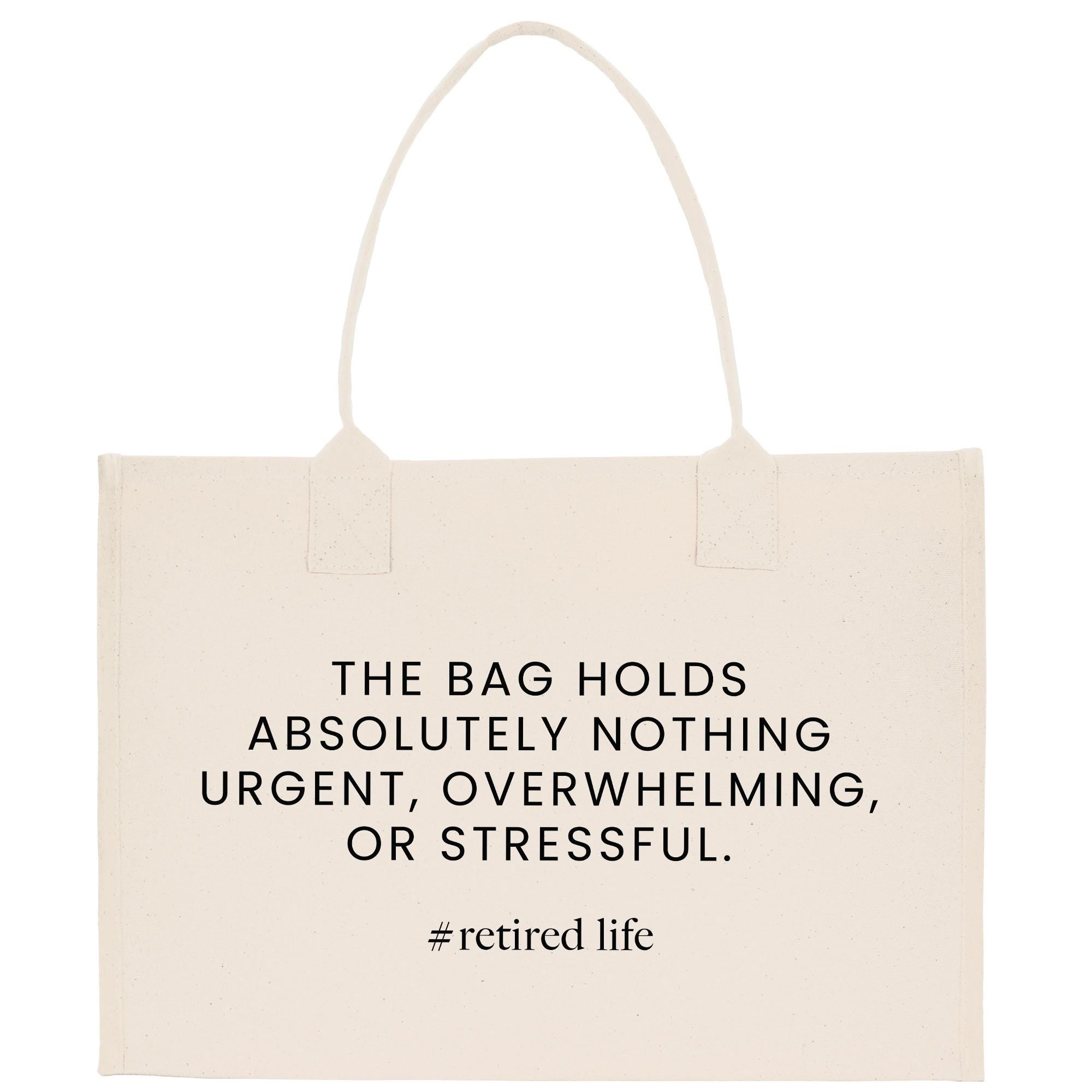 a beige tote bag with a printed quote that reads: &quot;THE BAG HOLDS ABSOLUTELY NOTHING URGENT, OVERWHELMING, OR STRESSFUL.&quot;