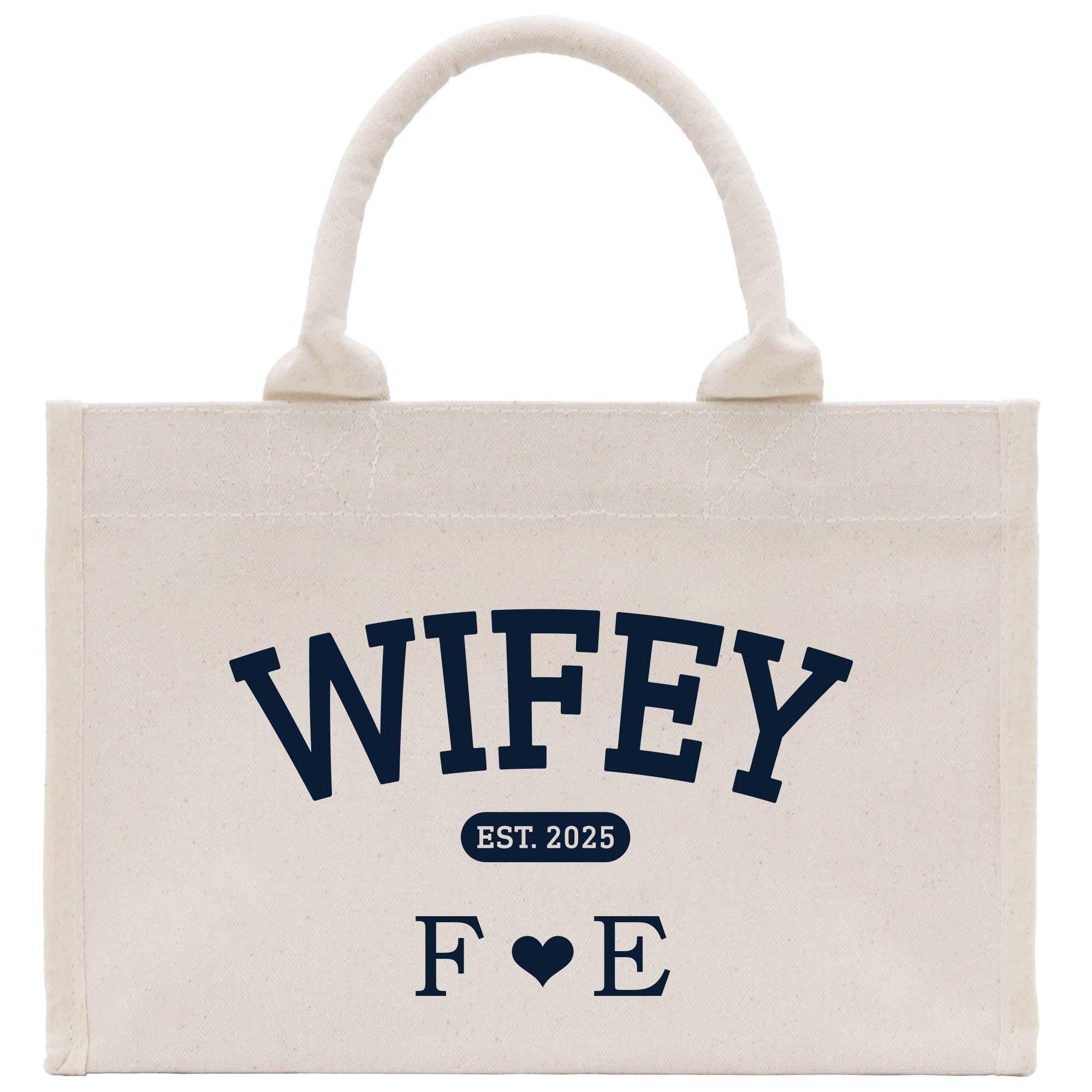 a white tote bag with the word wife printed on it
