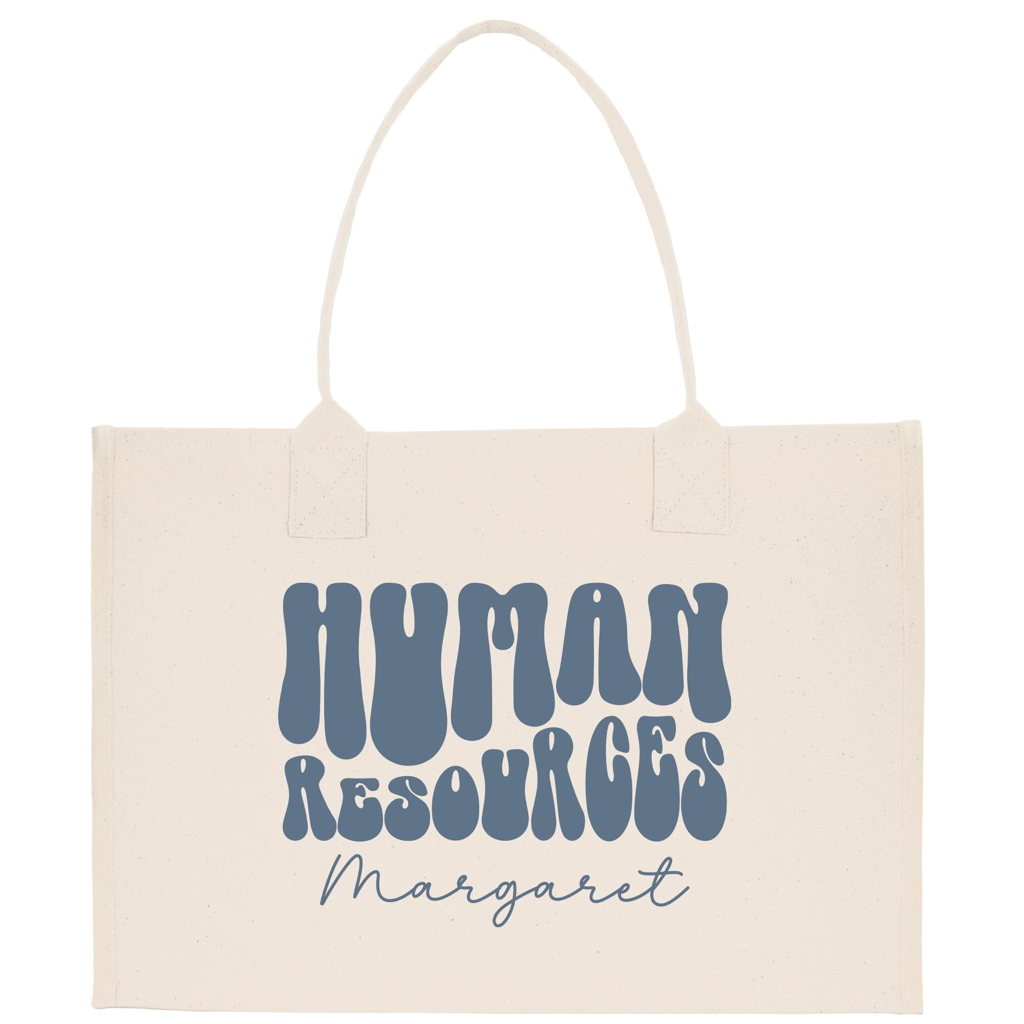 A beige tote bag with the text &quot;HUMAN RESOURCES MARGARET&quot; printed on it in a stylized font.