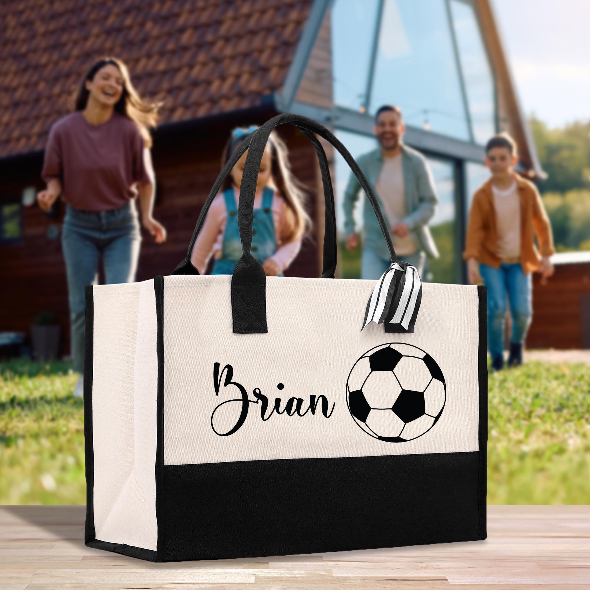 a black and white bag with a soccer ball on it