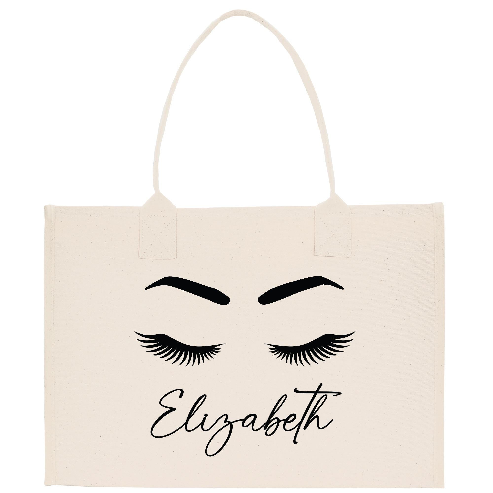 a white bag with eyelashes and eyelashes on it
