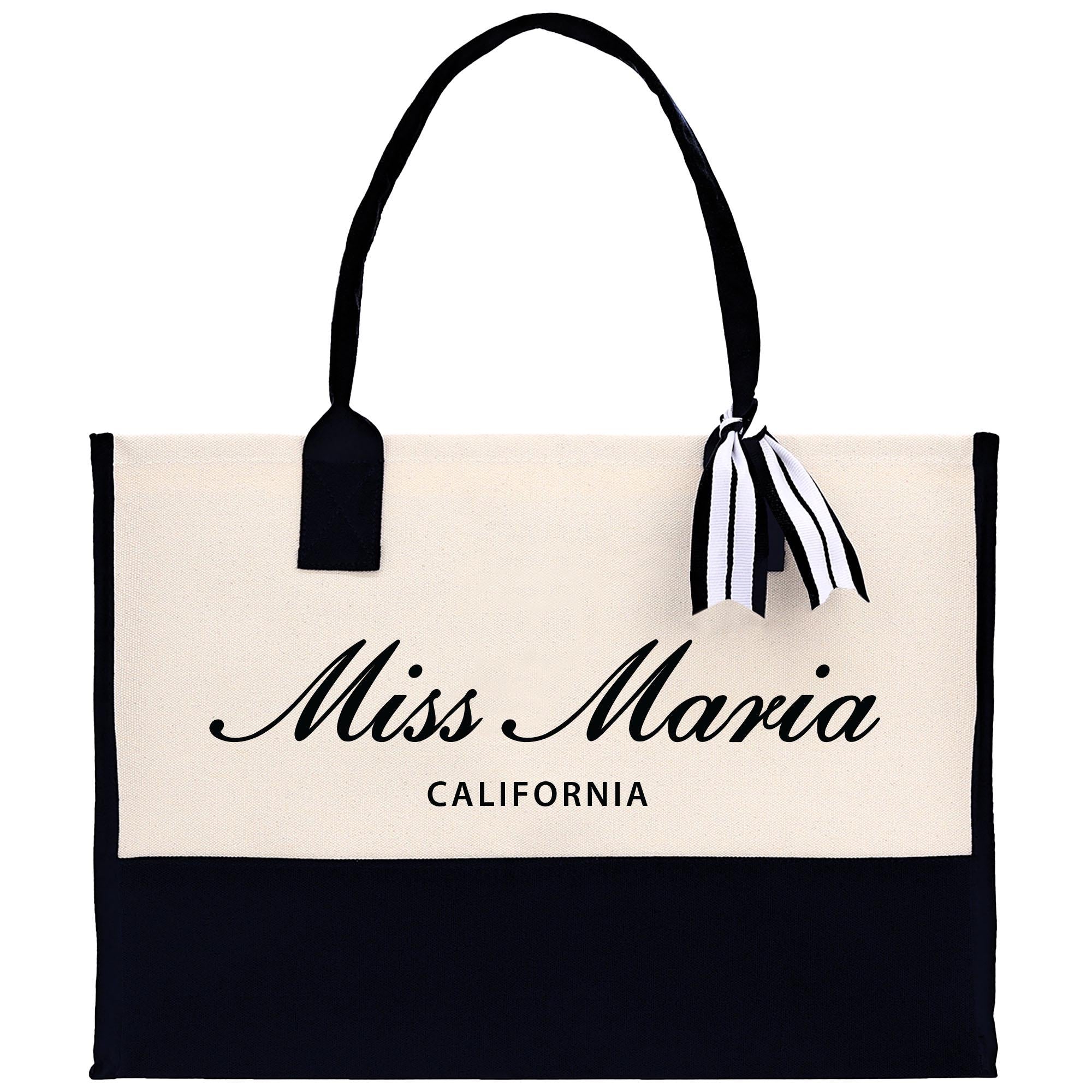 a black and white bag with a black and white ribbon