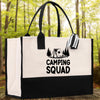 A black and white tote bag with the text 
