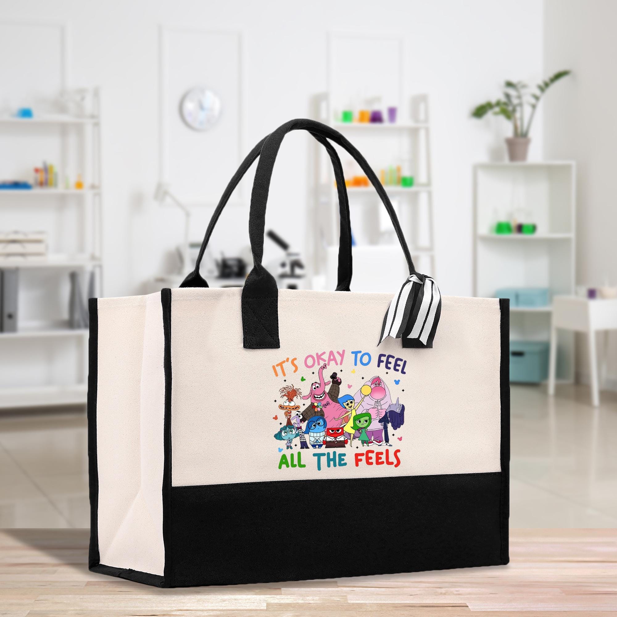 a black and white bag with a cartoon character on it