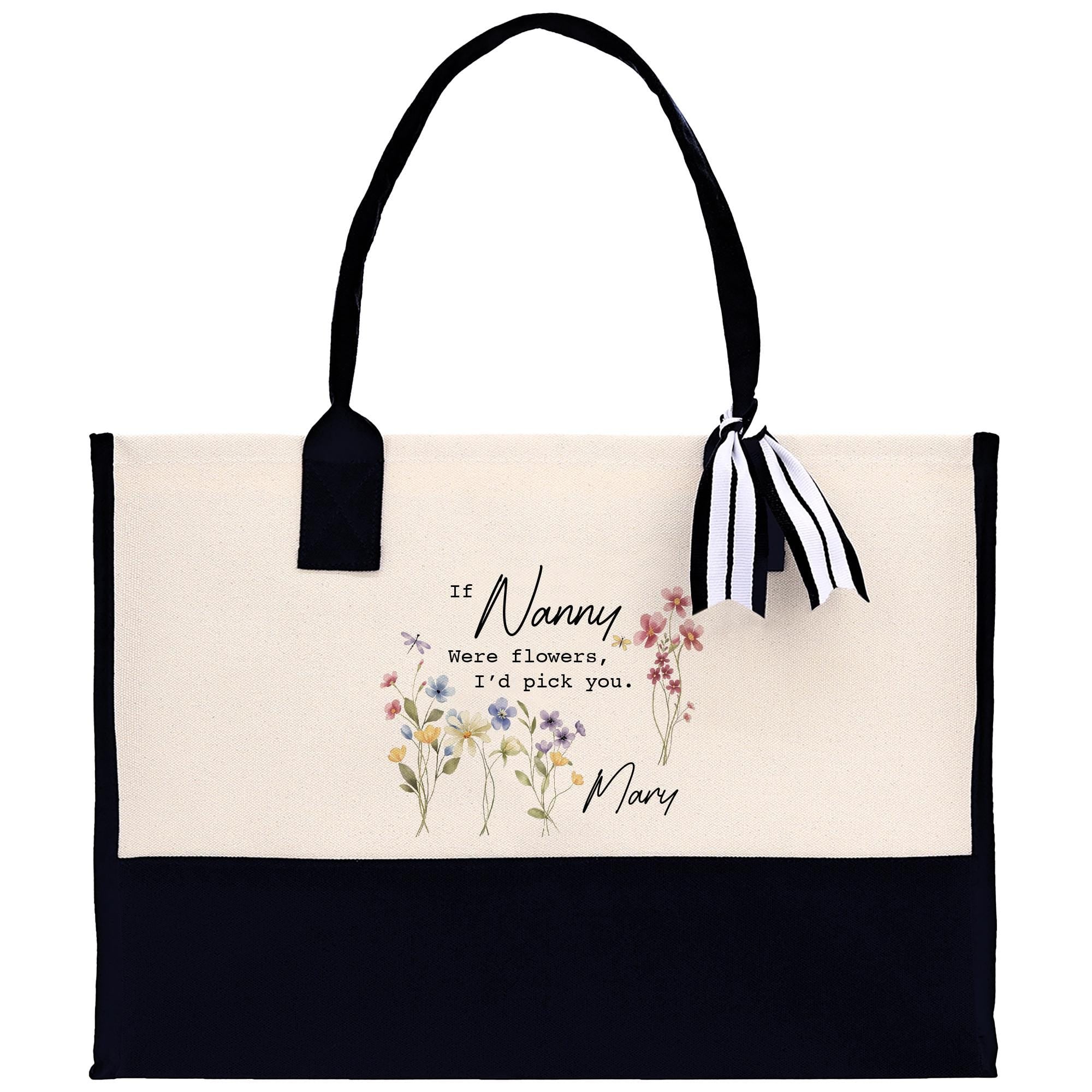 a black and white bag with flowers on it