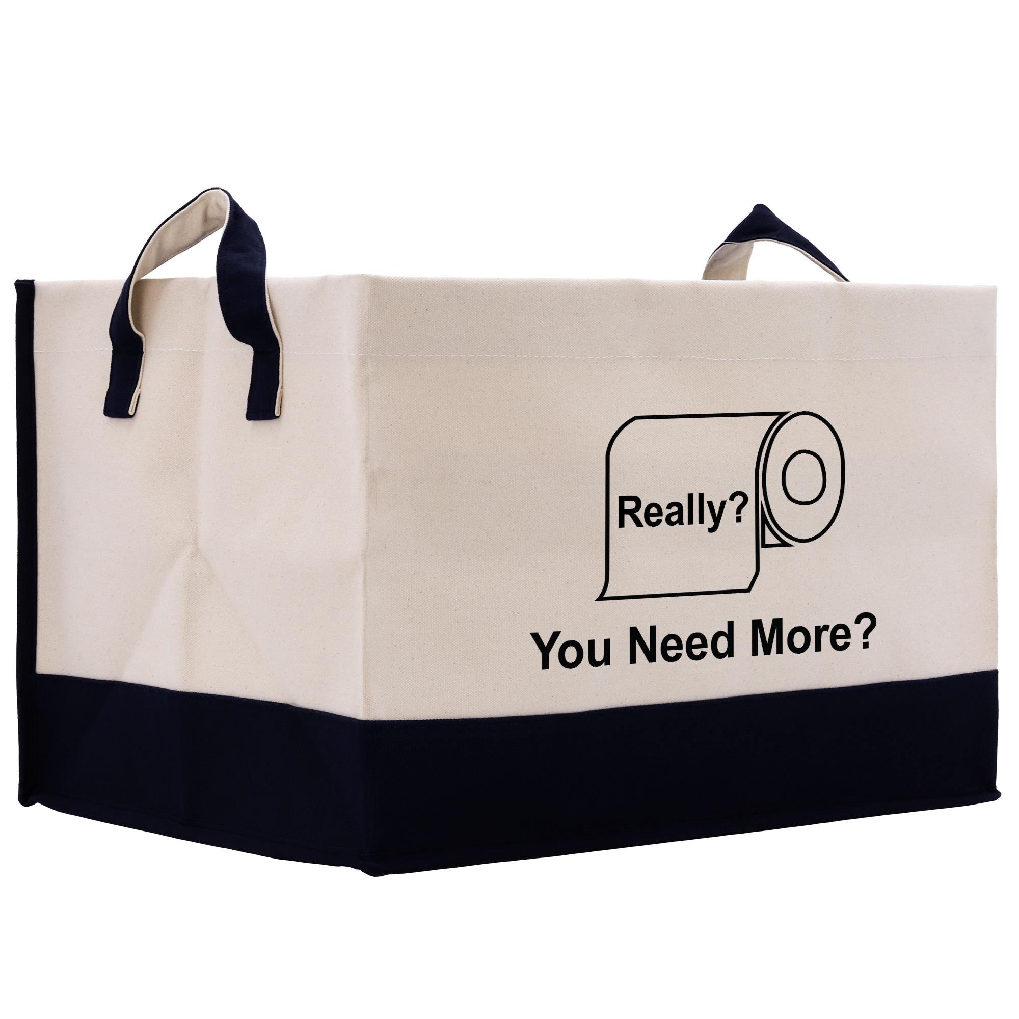 A beige tote bag with a black trim, featuring a humorous text and graphic on the front.