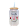 a white mason jar with pink flowers and a straw