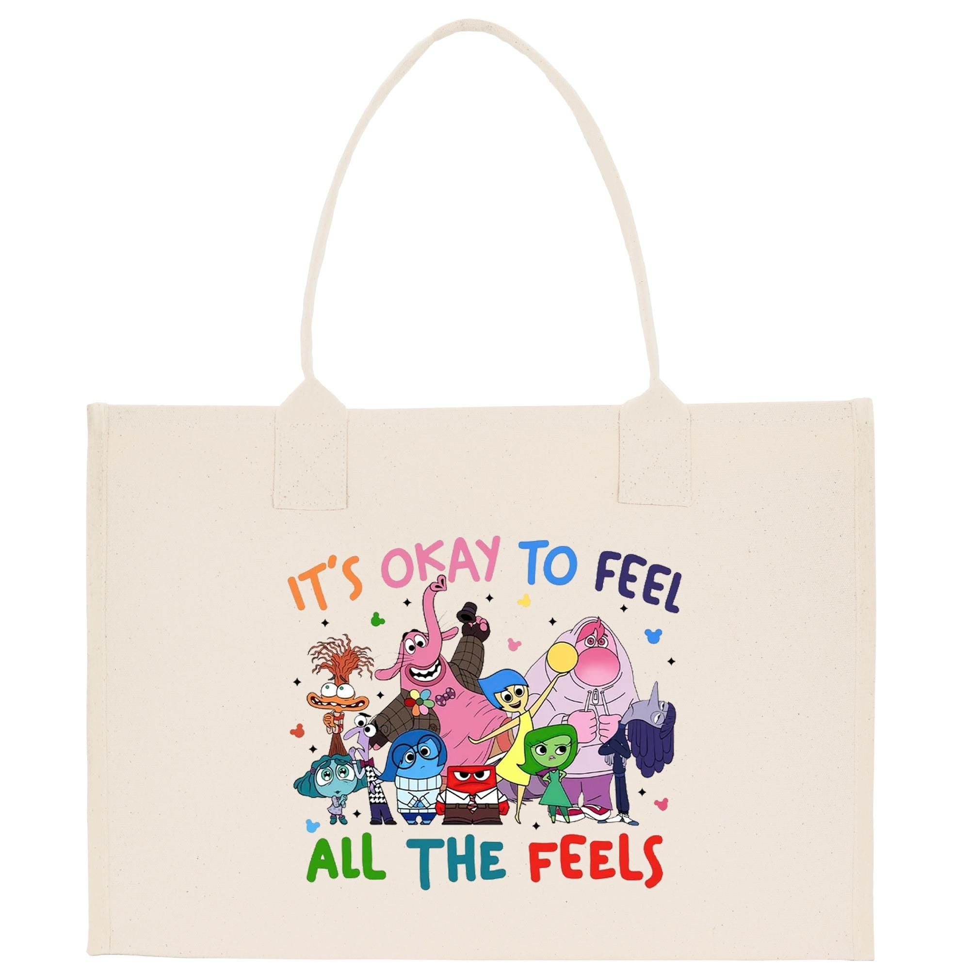 a tote bag with the words it&#39;s okay to feel all the feels