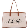 a white bag with a brown handle and the words lake life on it