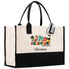 a black and white shopping bag with the words christmas on it