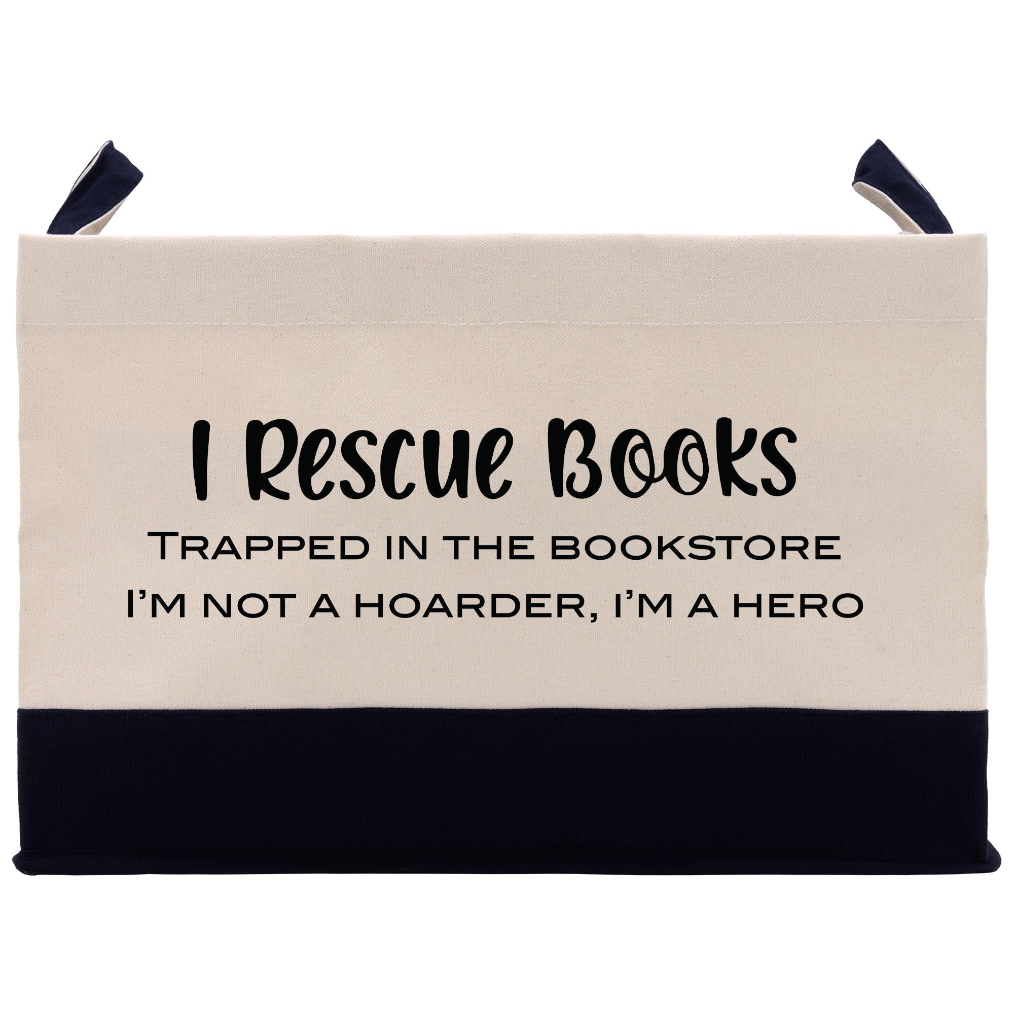 a beige and navy blue tote bag with the text &quot;I Rescue Books&quot; printed on it.