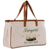 a white bag with a brown leather handle