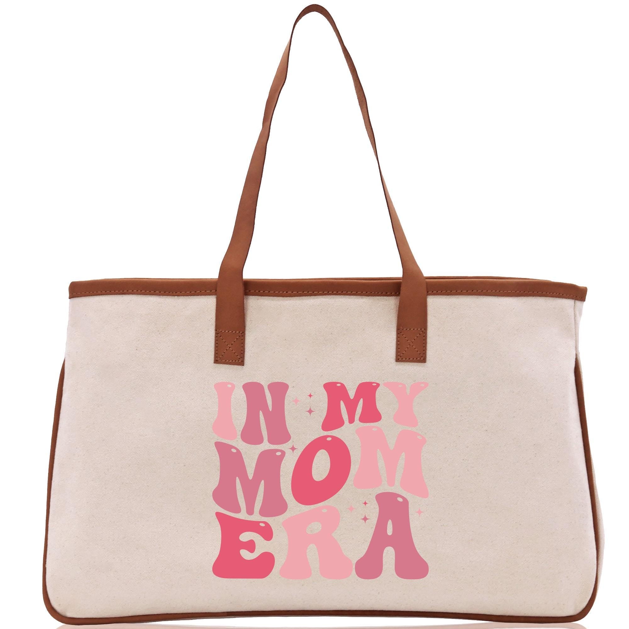 a white bag with pink letters on it