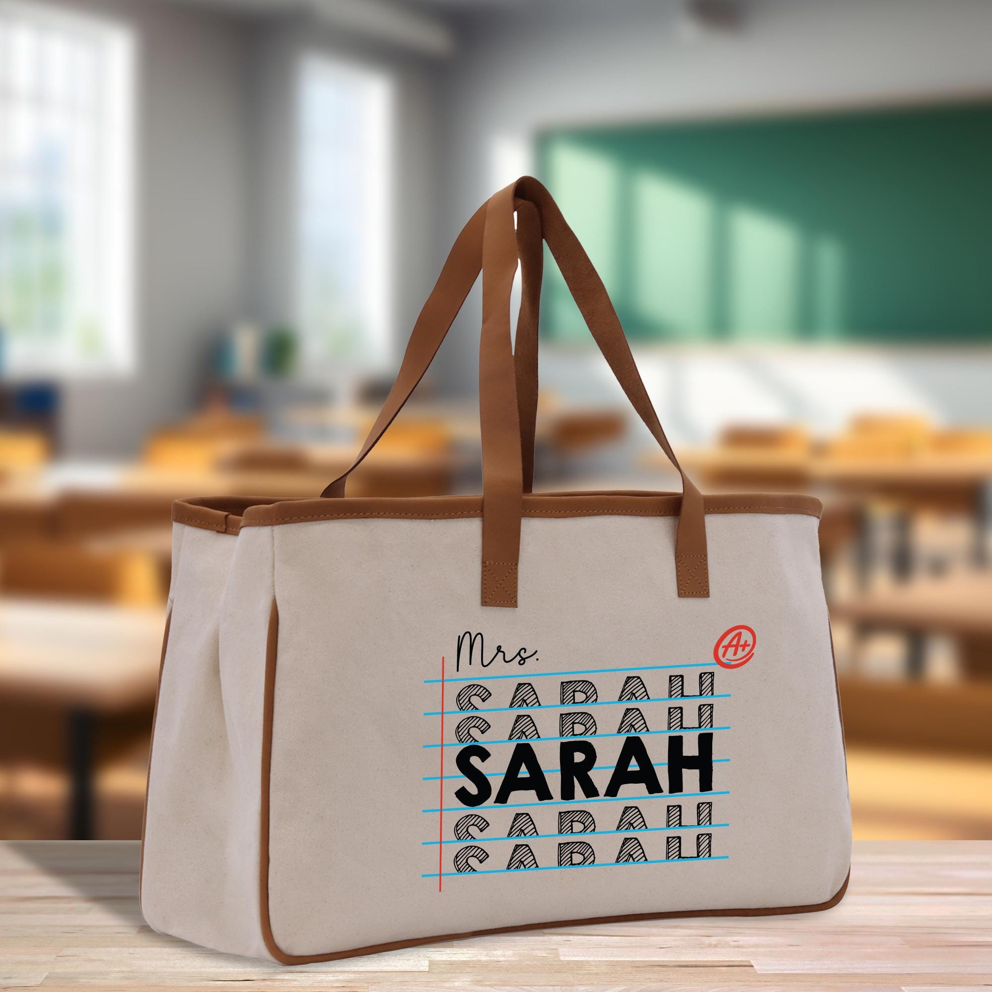 a canvas tote bag with arabic writing on it