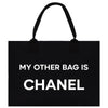 a black tote bag with the words'my other bag is chanel '