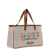 a canvas tote bag with a logo on it