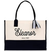 a black and white bag with a black and white ribbon