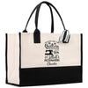 a black and white tote bag with the words quilters, quilters,