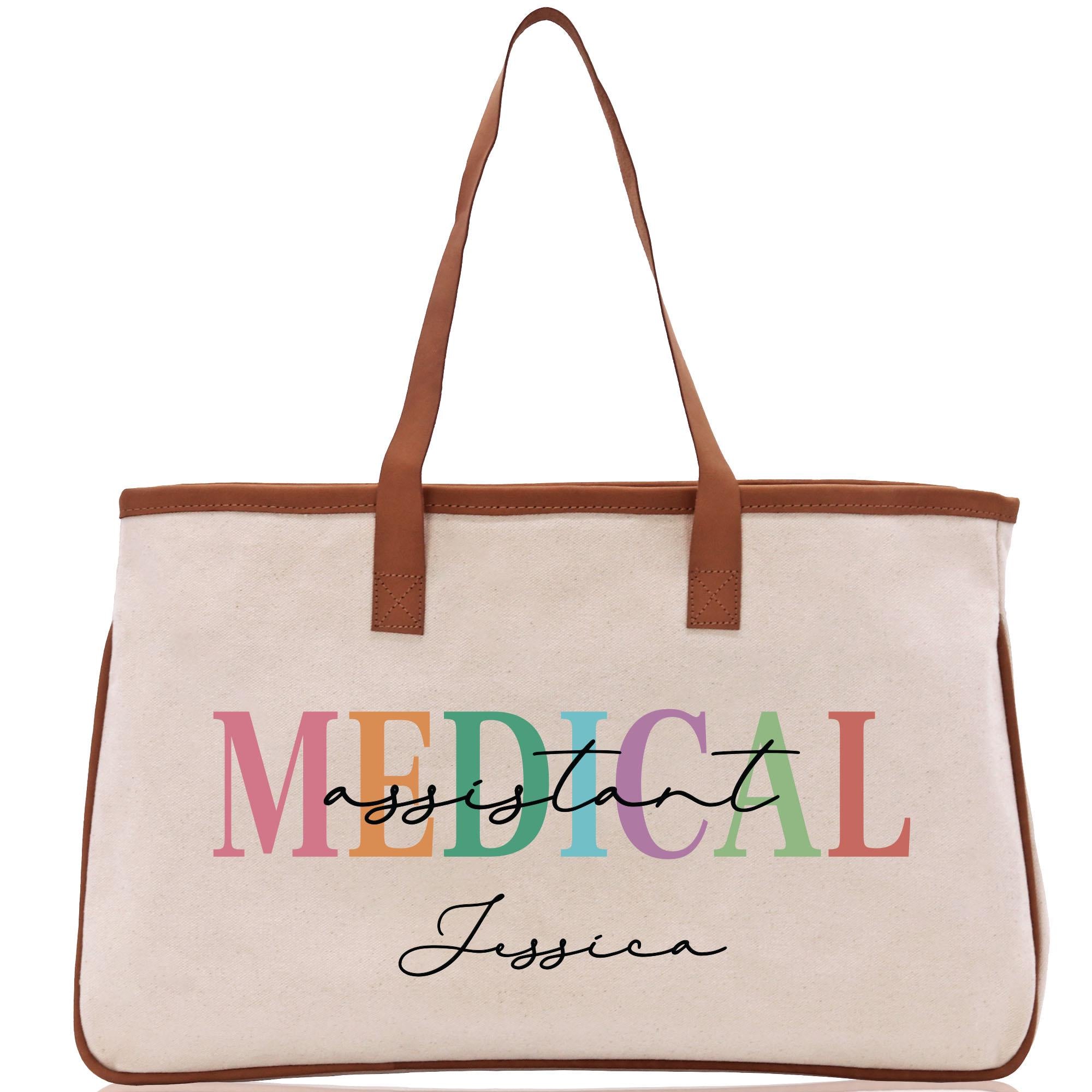 a white medical bag with a brown handle