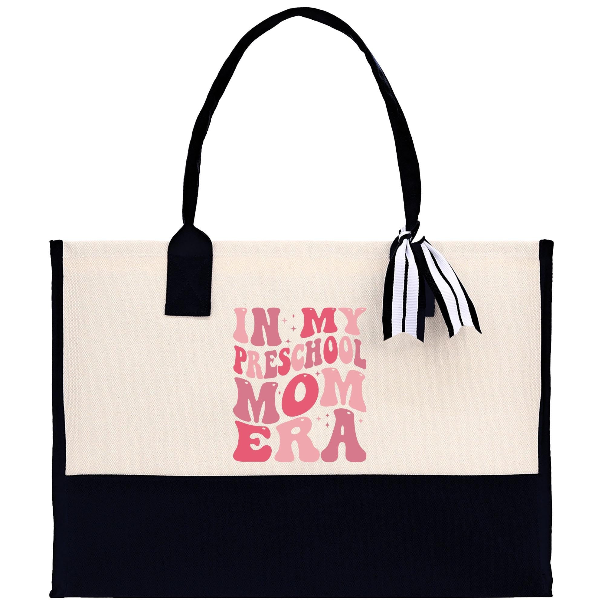 a white and black bag with a black handle
