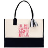 a white and black bag with a black handle