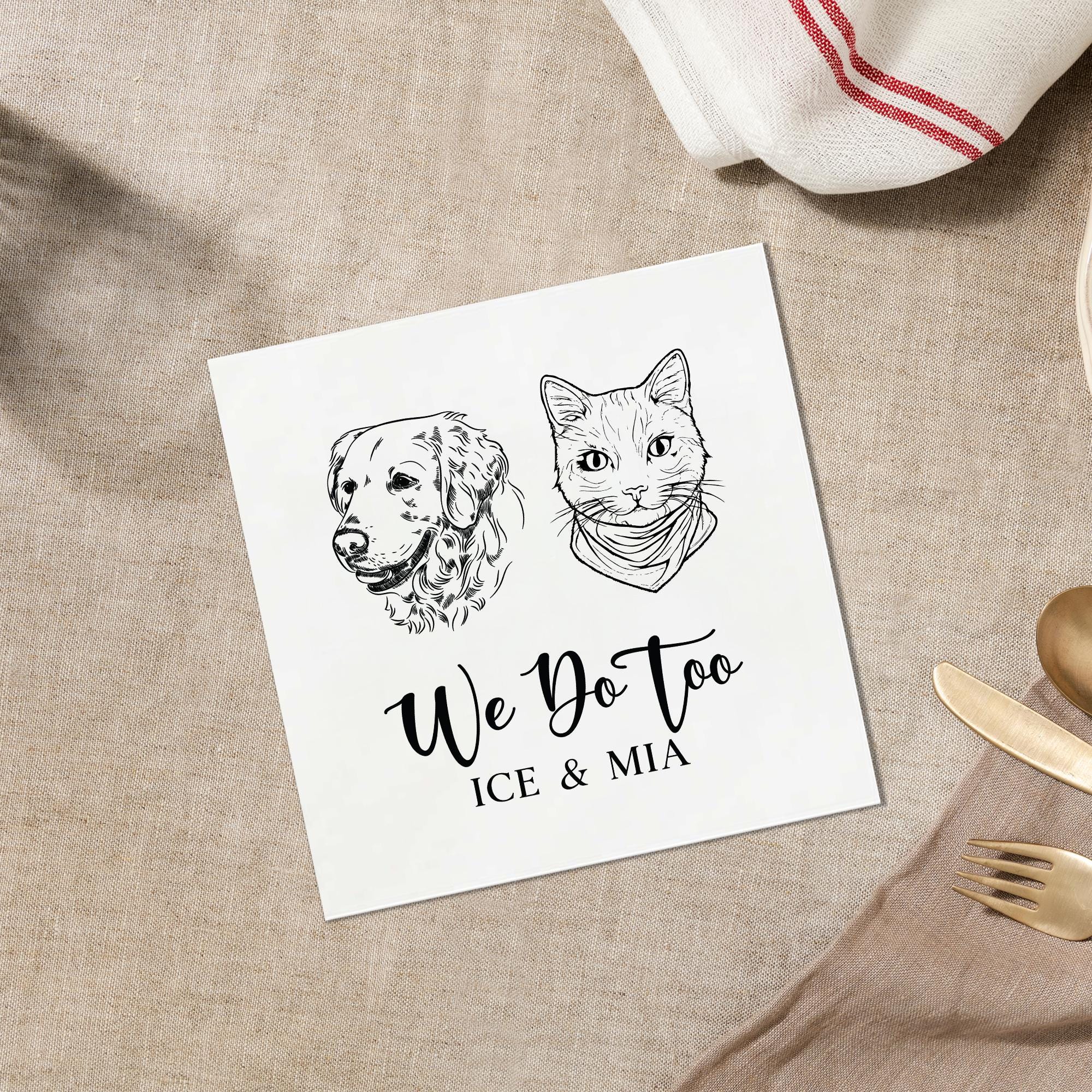 A white napkin with a black and white illustration of a dog and a cat, along with the text &quot;We Do Too ICE & MIA&quot; printed on it.
