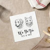 A white napkin with a black and white illustration of a dog and a cat, along with the text "We Do Too ICE & MIA" printed on it.