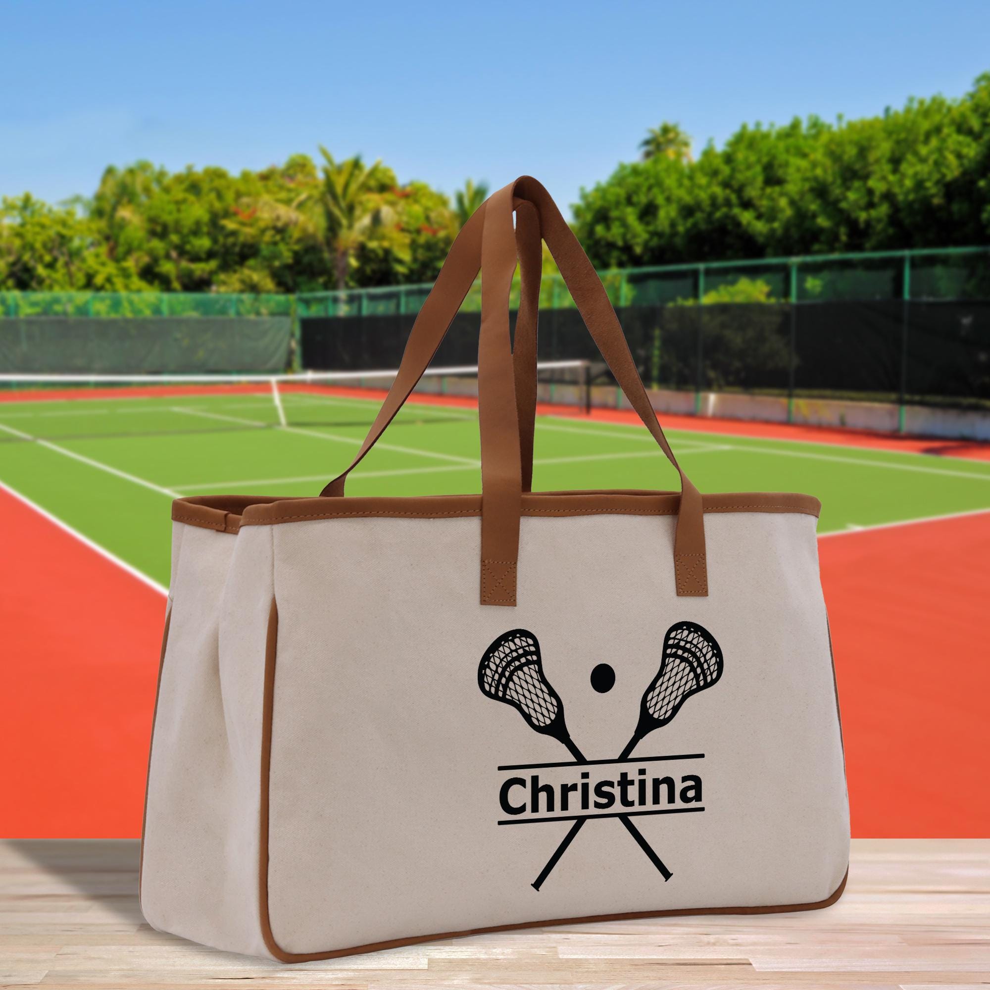 a bag with a tennis racket and ball on it