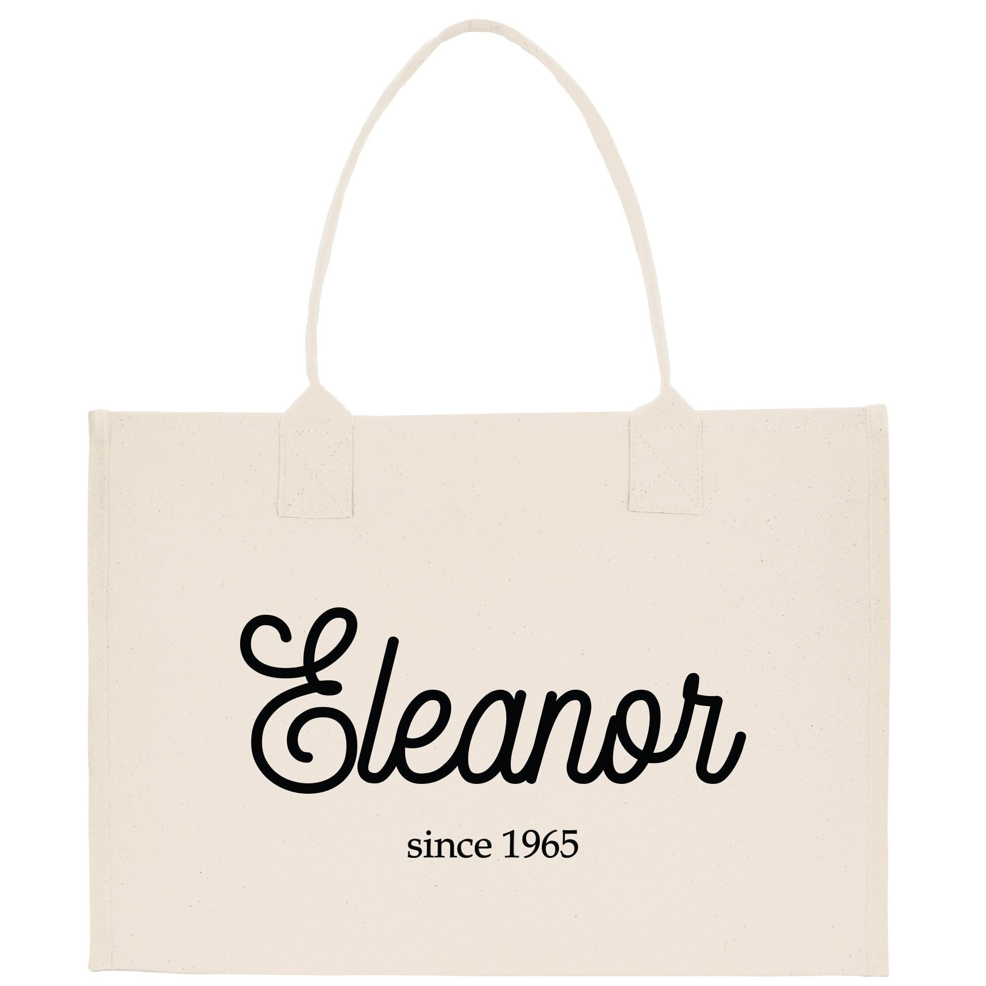 a white shopping bag with a black and white logo
