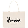 a white shopping bag with a black and white logo