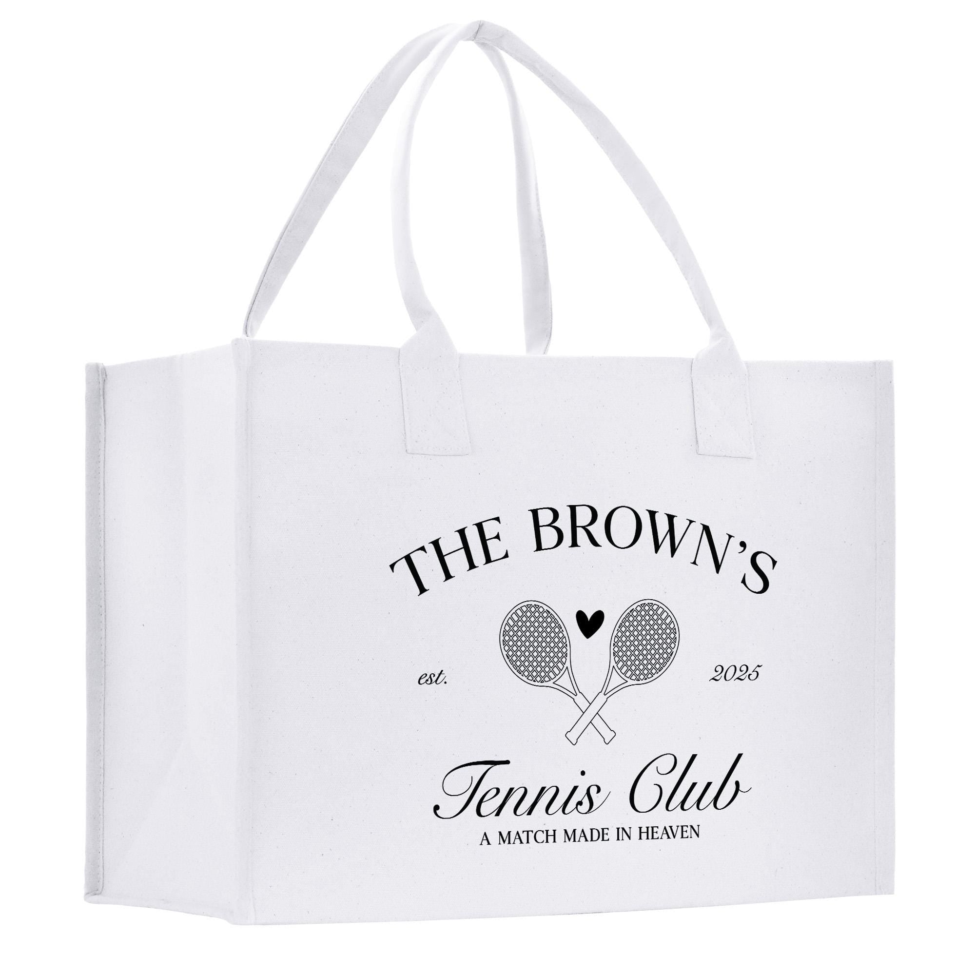 A white tote bag with black text and graphics printed on it.