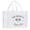 A white tote bag with black text and graphics printed on it.