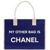 a blue bag with a white handle that says, my other bag is chanel