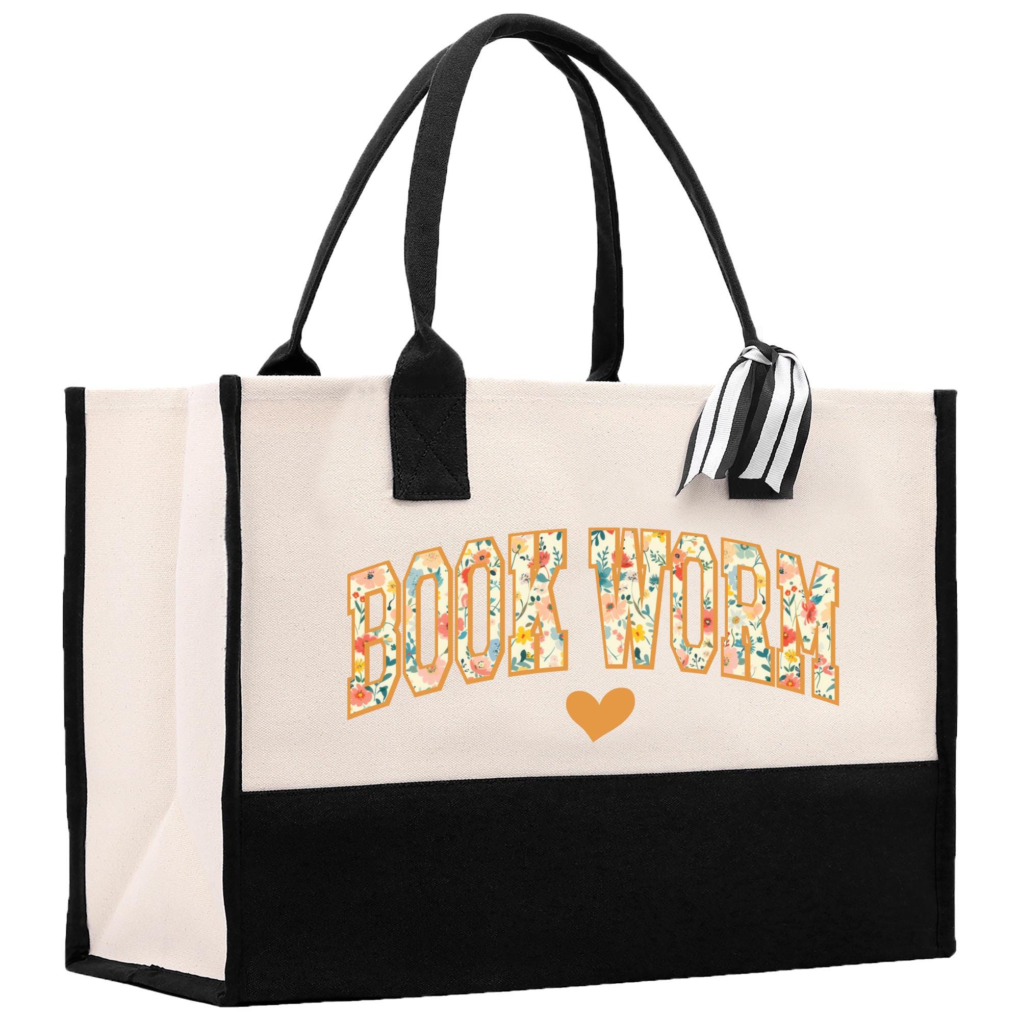a black and white bag with a book worm on it