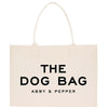a white bag with the words the dog bag on it