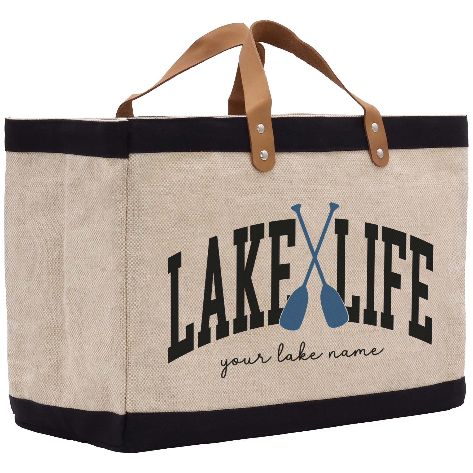 a large canvas bag with a pair of paddles on it