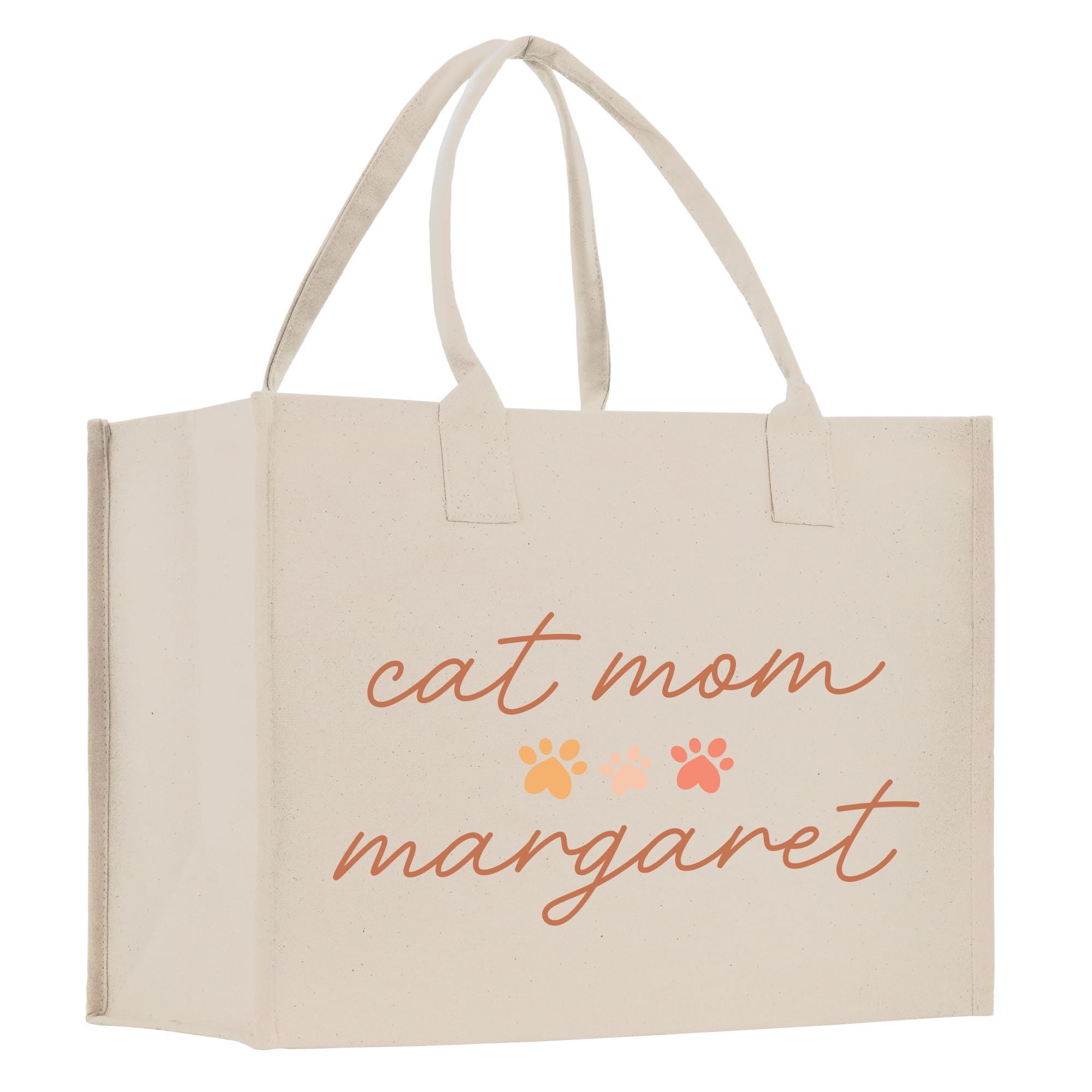 a white bag with a cat mom slogan on it