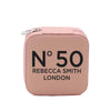 A pink makeup case with the text "N50 Rebecca Smith London" printed on it.