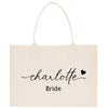 a white bag with the words charlotte on it