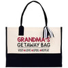a white and black bag with a black handle