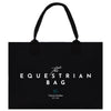 The image is a black bag with white text and a logo, which appears to be a bag or accessory related to equestrian activities.