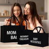 two women sitting at a table with black shopping bags