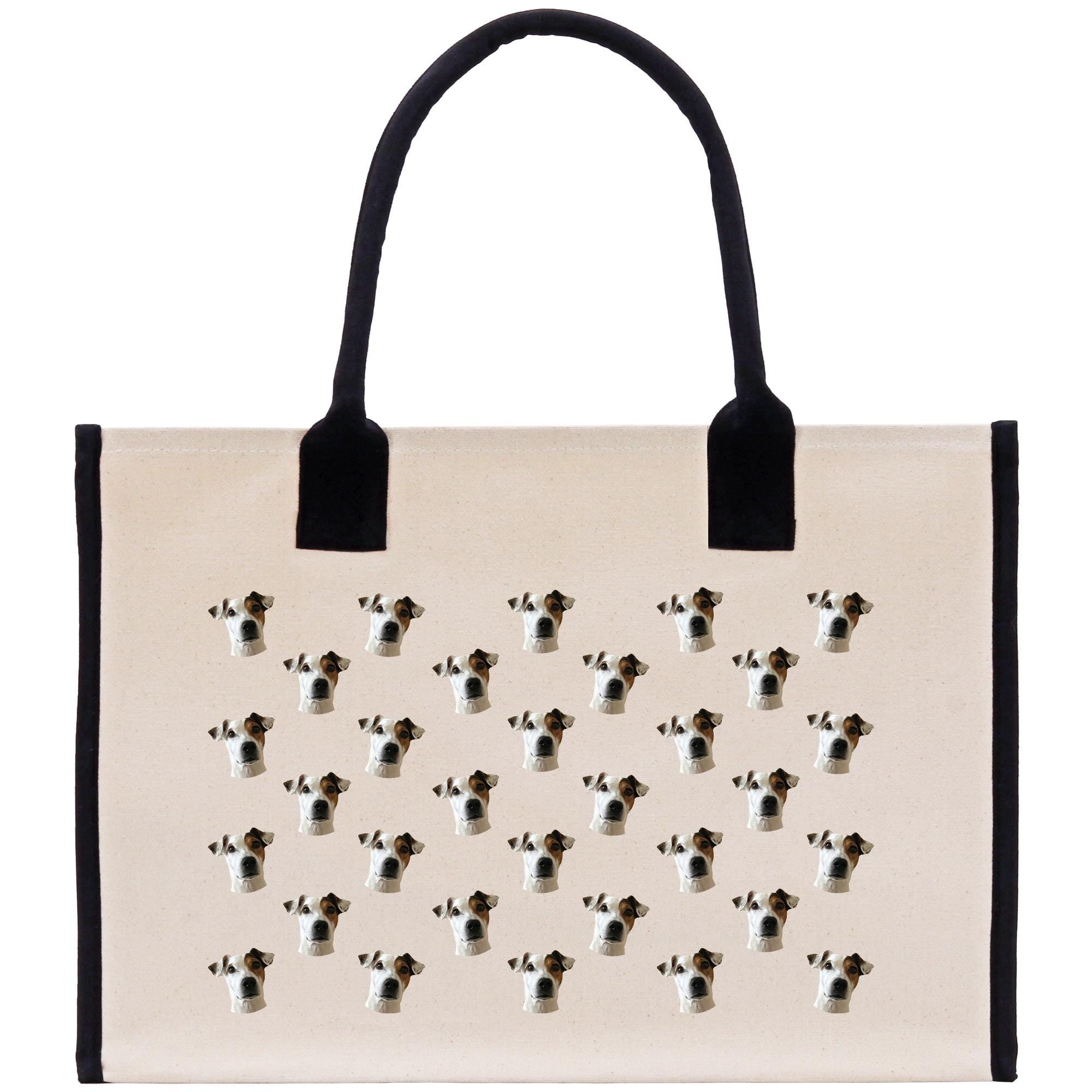 a beige tote bag with a repeating pattern of black and white dog faces on it.